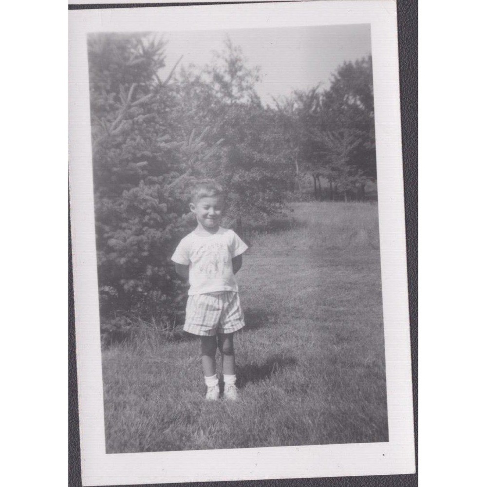 Vintage 1950s Snapshot Photo Young Boy Plaid Shorts Outdoors Unidentified